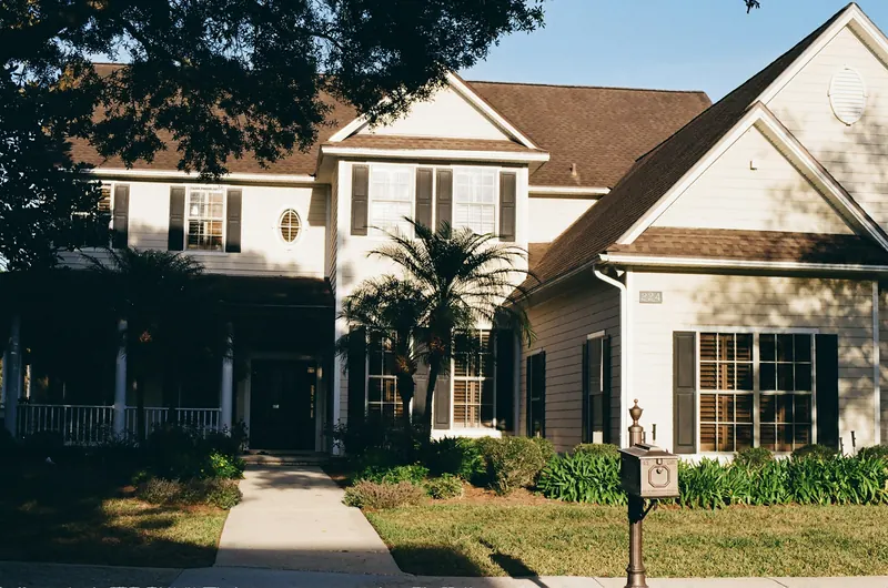 Two-story American suburban home with a covered front porch